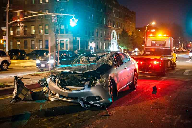Car crash at night city